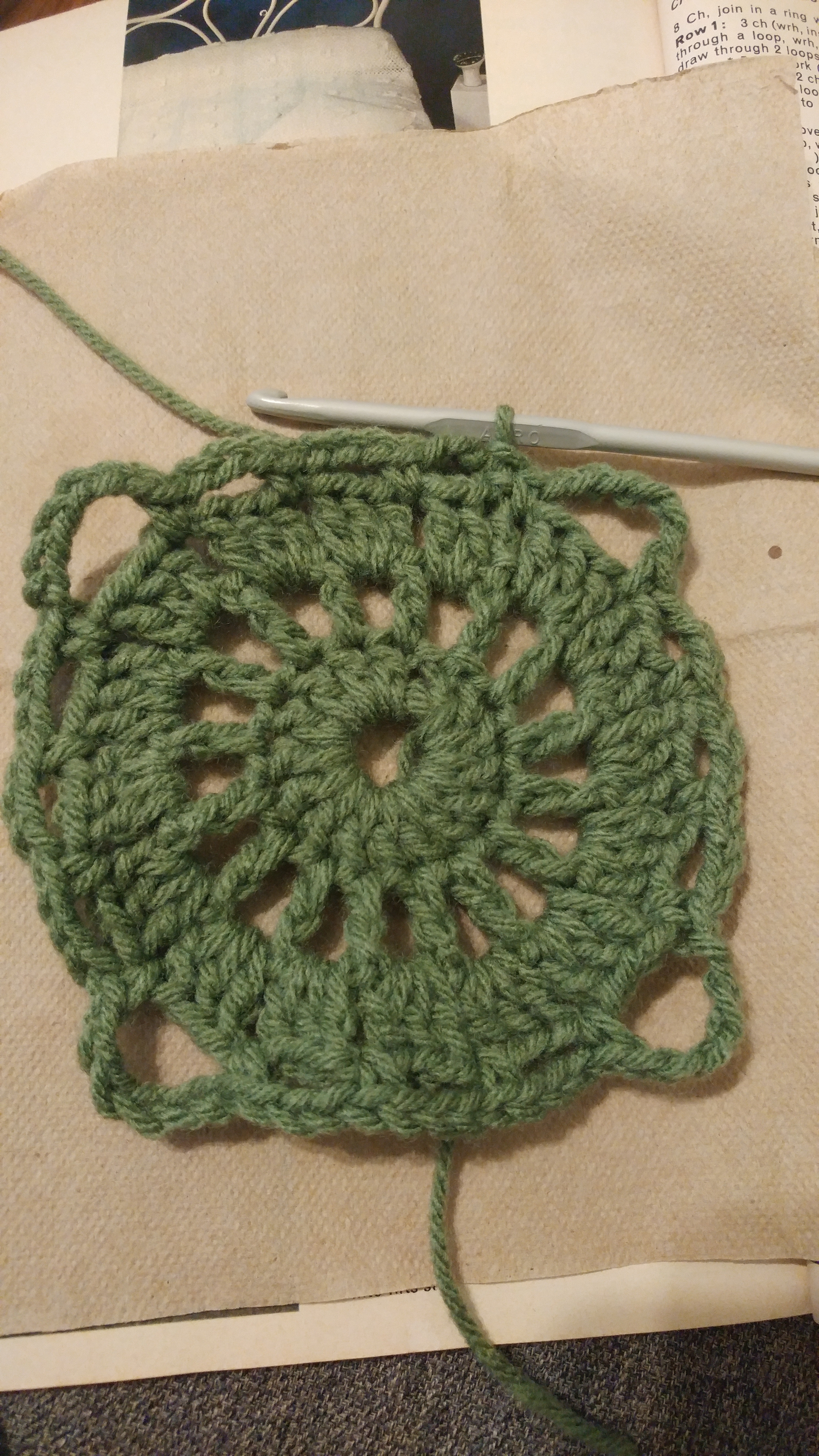 Fancy Square Row 4 Round 4 of my green fancy square has added corners to it.