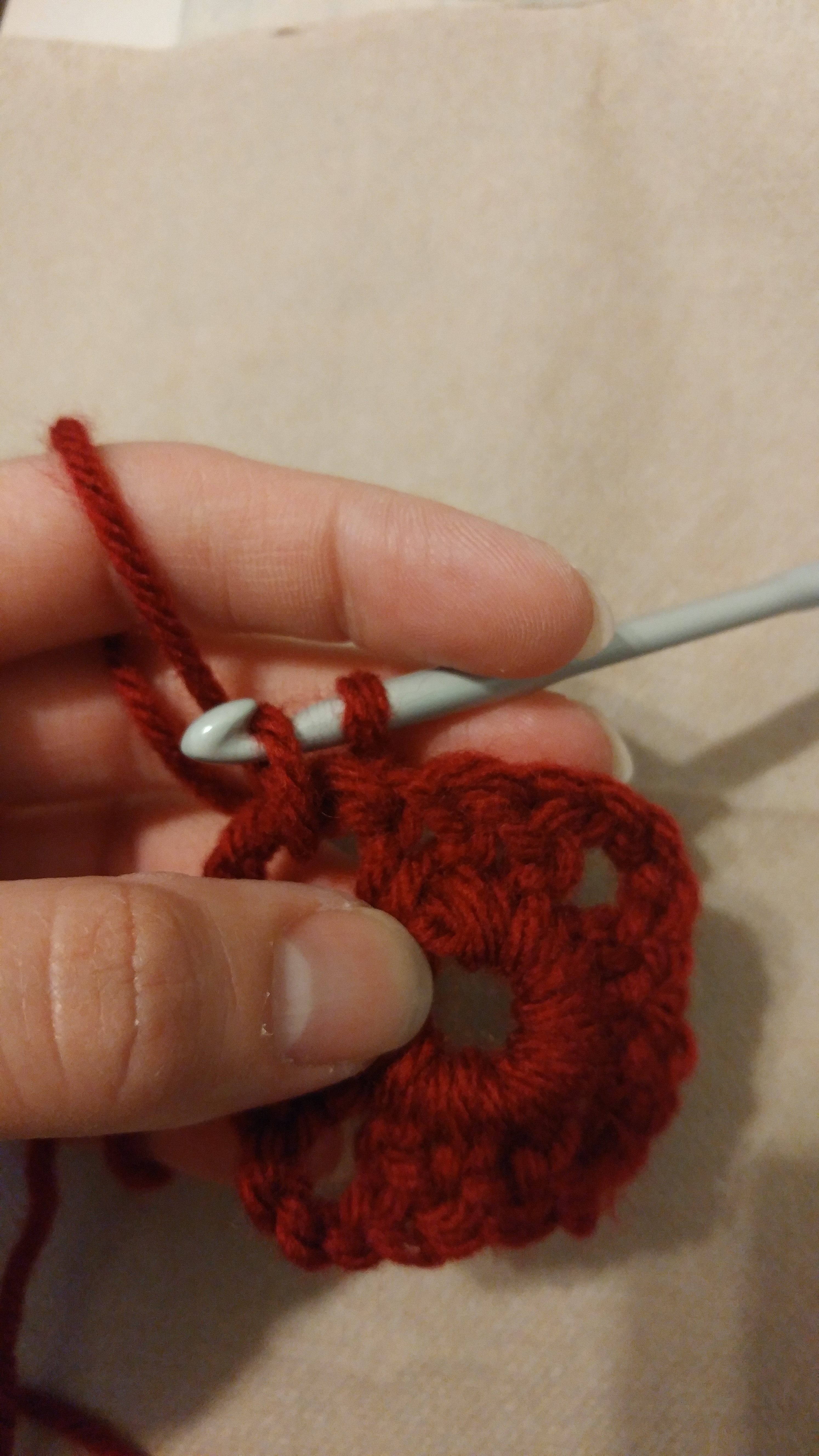 Plain Square Turning Slip Stitch A close up of me showing where I make the slip stitch after turning my plain claret red square.
