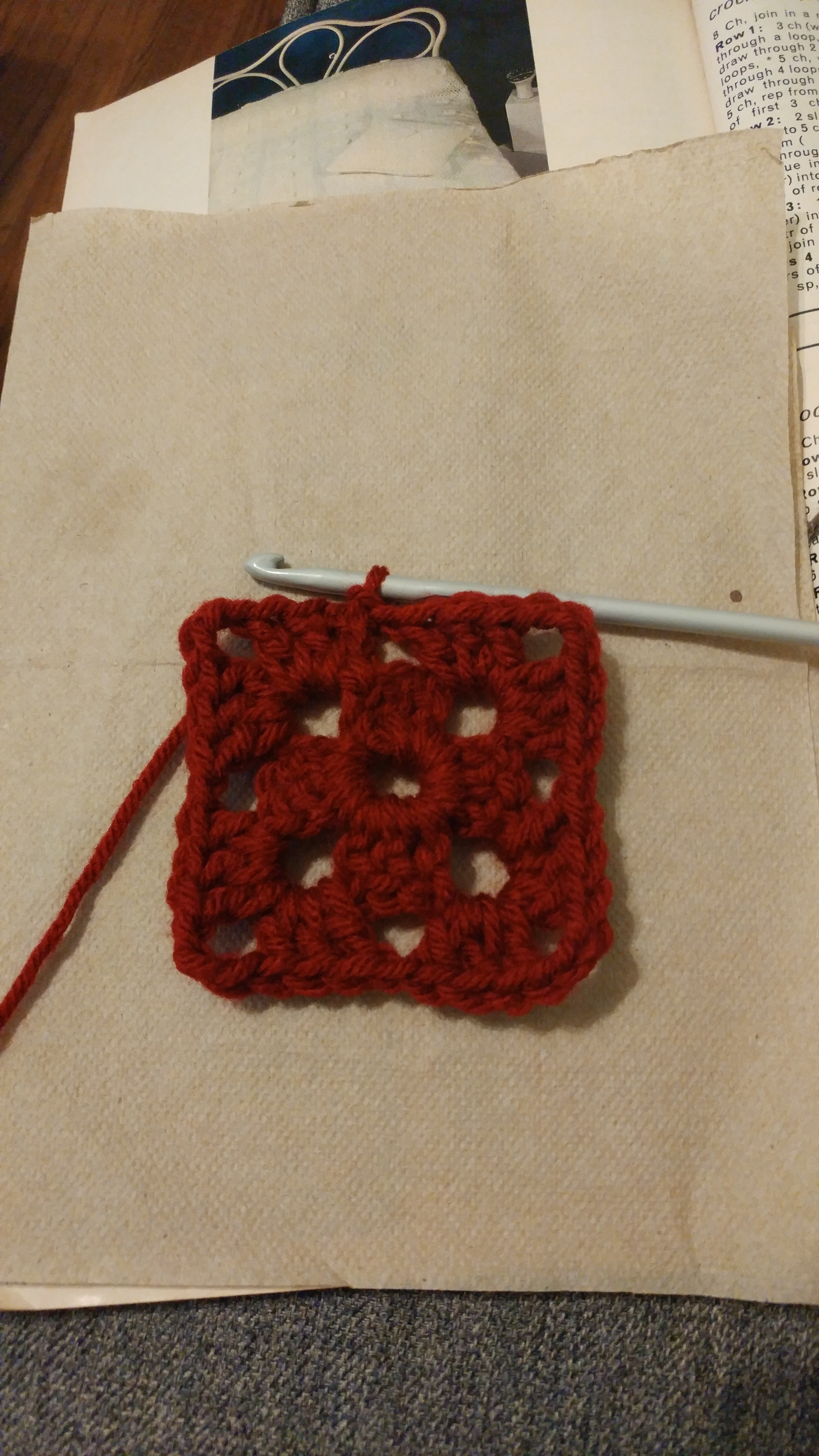 Plain Square Row 2 Round 2 of my claret red plain square; each side has two clusters in between the corners.