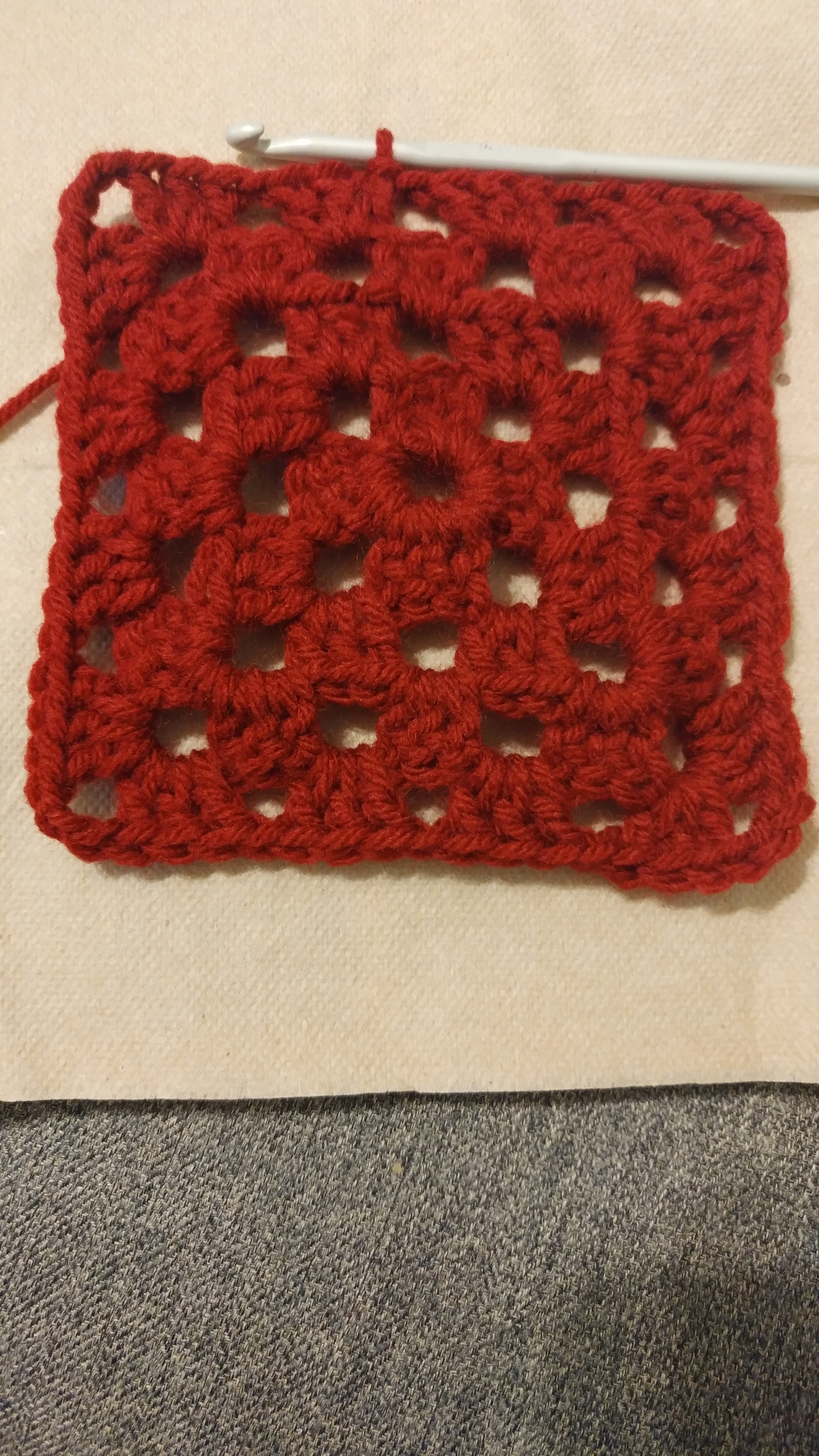 Plain Square Row 4 Round 4 of my claret red plain square; each side has 4 clusters between the corners.